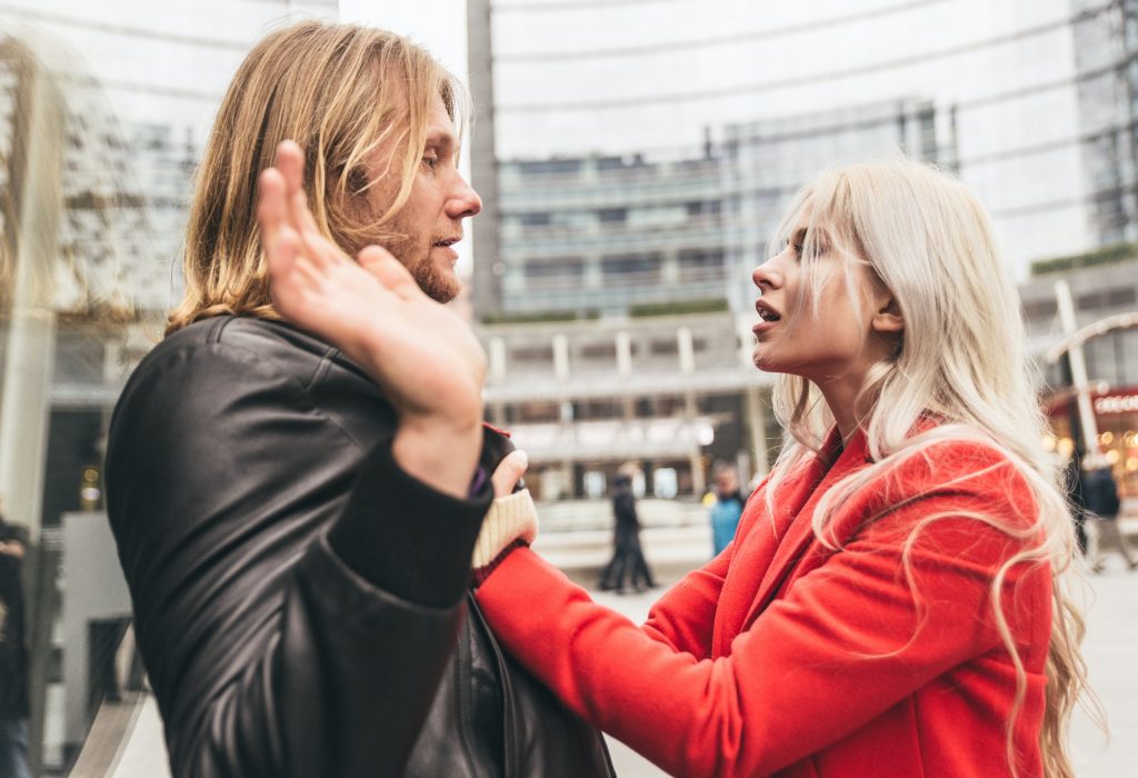 Couple fighting in an urban area of the city